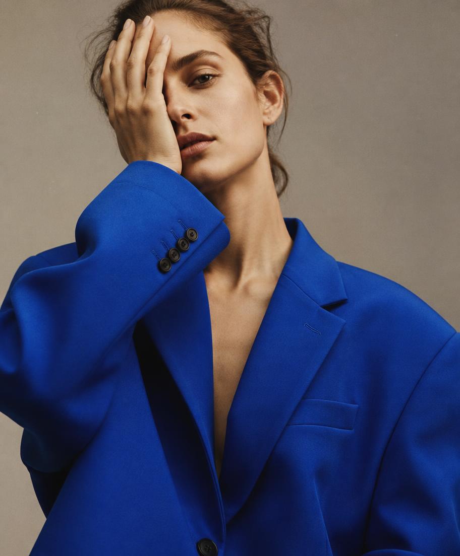 Model in a cobalt blue oversized blazer
